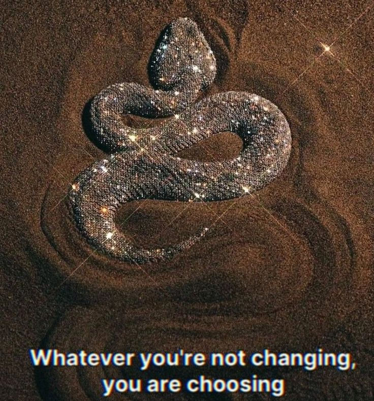 Sparkling snake-shaped design in sand with glittering effect. Text below reads, "Whatever you're not changing, you are choosing."