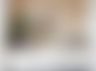 “Quiet artist studio scene with canvas and paint supplies, calm creative atmosphere