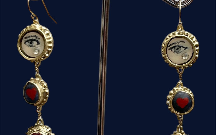 Earrings with hand painted eyes.