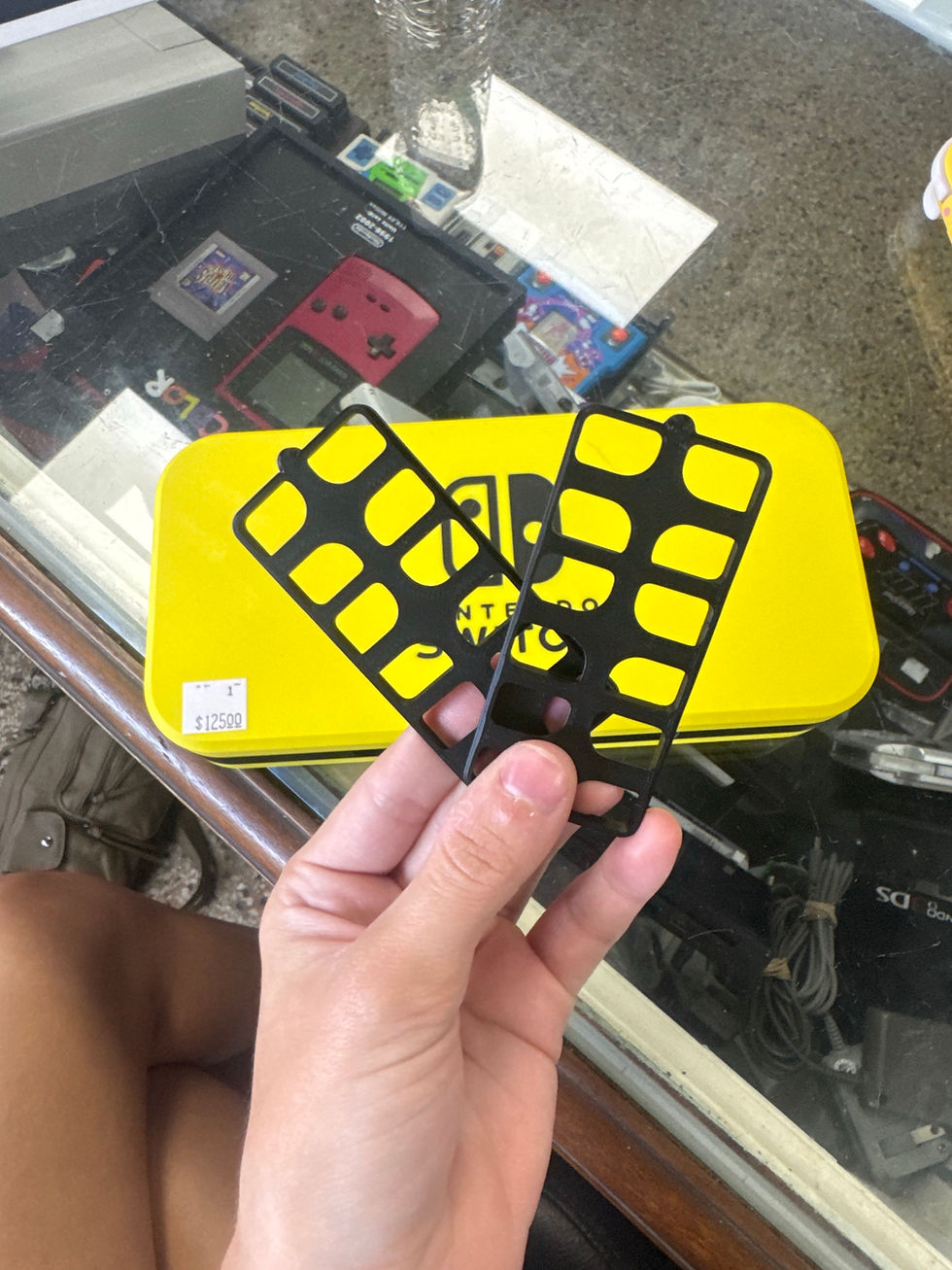 Thumbnail: Nintendo switch Lite Yellow with case and 3-D printed game and cable holders