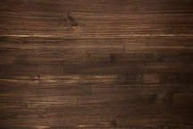 dark-wooden-background-autentic-board-top-view.jpg