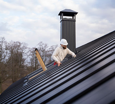 closeup-worker-hands-installing-yellow-ceramic-roofing-tiles-mounted-wooden-boards-coverin