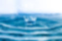 water-background-with-waves-drop-falling.jpg