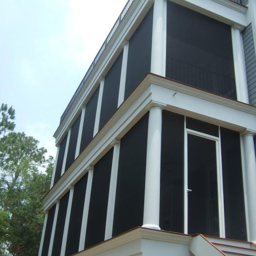 House with black retractable screens