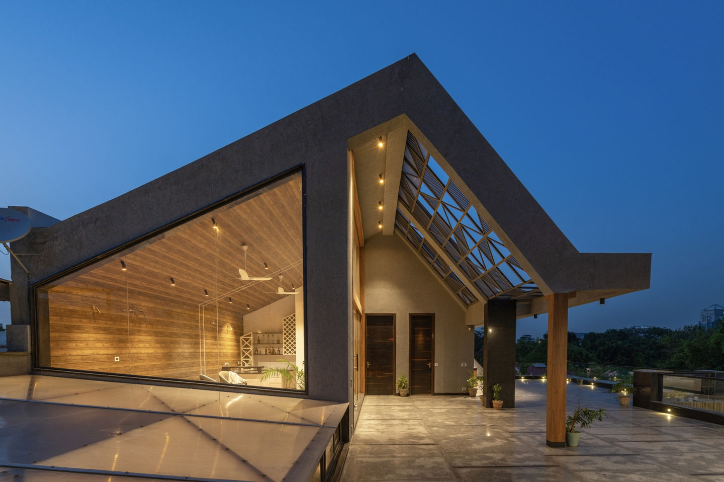 Modern angular luxury villa with geometric design, glass facade, and contemporary residential architecture by Design Acrolect Gurgaon India