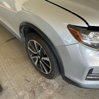 Large dent repair on right front fender