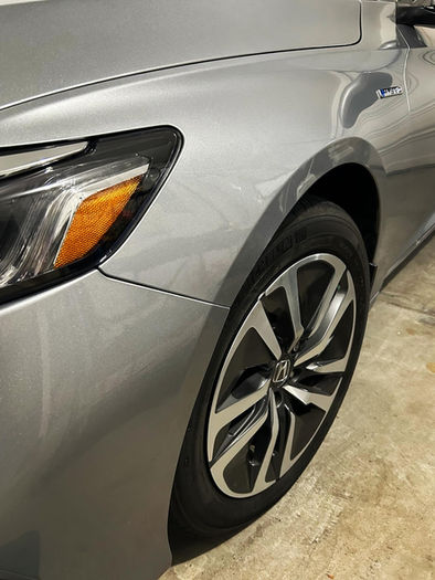 Front left fender dent repair completed on this Honda Accord