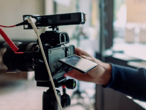 A content partner lines up the first shot of a YouTube video for their client.