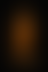 Dark, cinematic hangar scene with a narrow vertical beam of golden light cutting through partially opened doors. A lone person stands facing a large, shadowed mechanical rig on the right, its cables and joints faintly glowing. Dust floats in the half-light, creating a tense, secretive atmosphere. The image is titled “Case File #005 – The First Controlled Peek.”