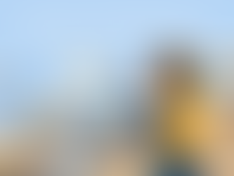 a woman with a clip board take photos of property furniture as part of an inventory report