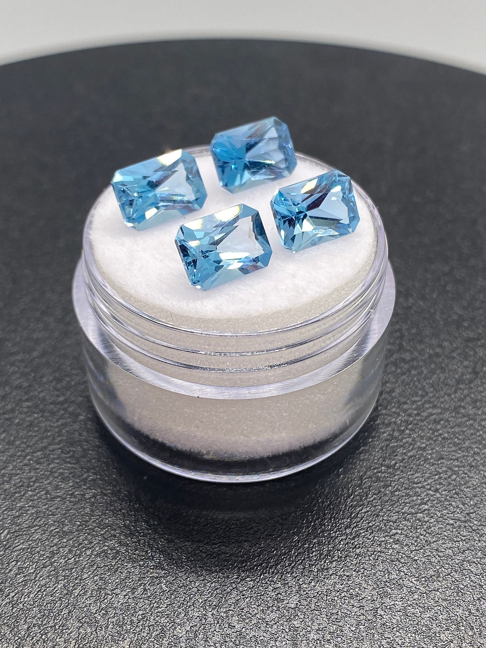 ภาพขนาดย่อ: London blue topaz | Four pieces of 8 x 6 mm