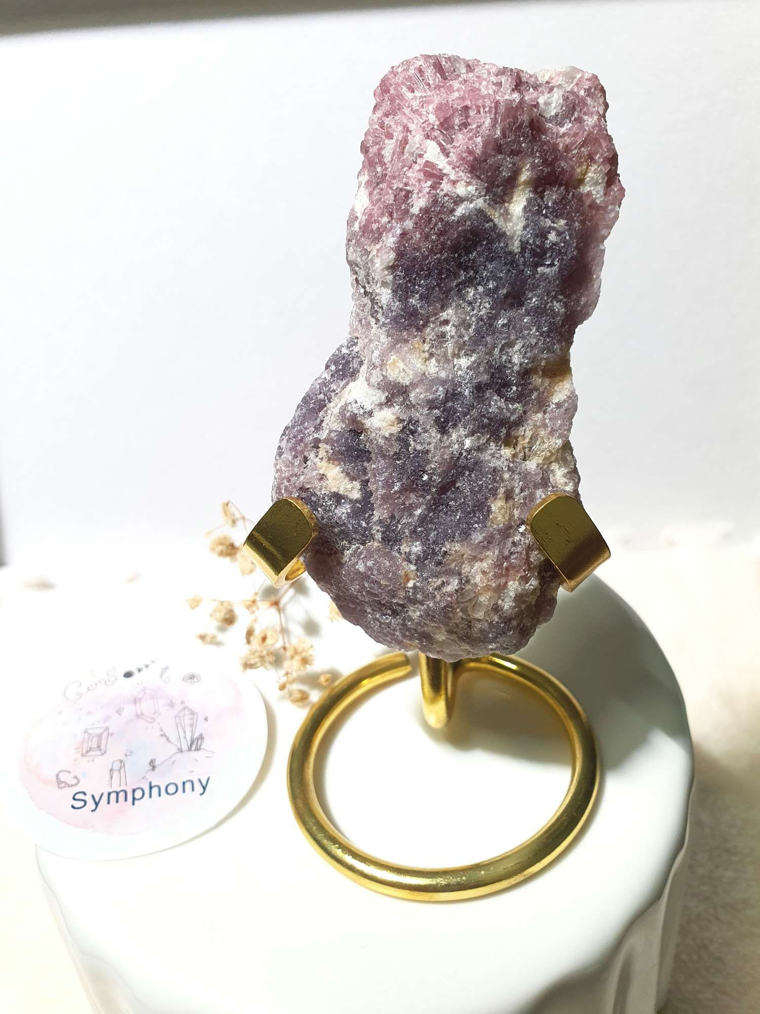 Raw Pink Tourmaline Lepidolite Quartz with gold stand.