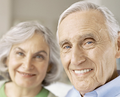 Older Couple is happy Tacoma dentist guarantees dental treatment