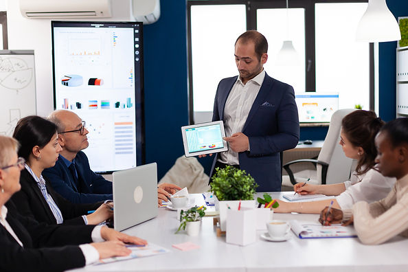 succesful-business-man-presenting-good-evolution-company.jpg