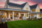 Beautiful luxury home exterior at sunset. Features large covered patio with outdoor furnit