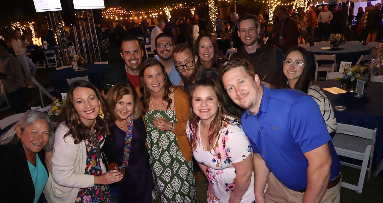 65 Roses Fundraiser at Benbrook Stables Venue in Fort Worth, Texas, bringing together over 355 community leaders, top chefs, and restaurants to support those affected by cystic fibrosis. The event takes place in a spacious venue with flexible indoor and outdoor areas.
