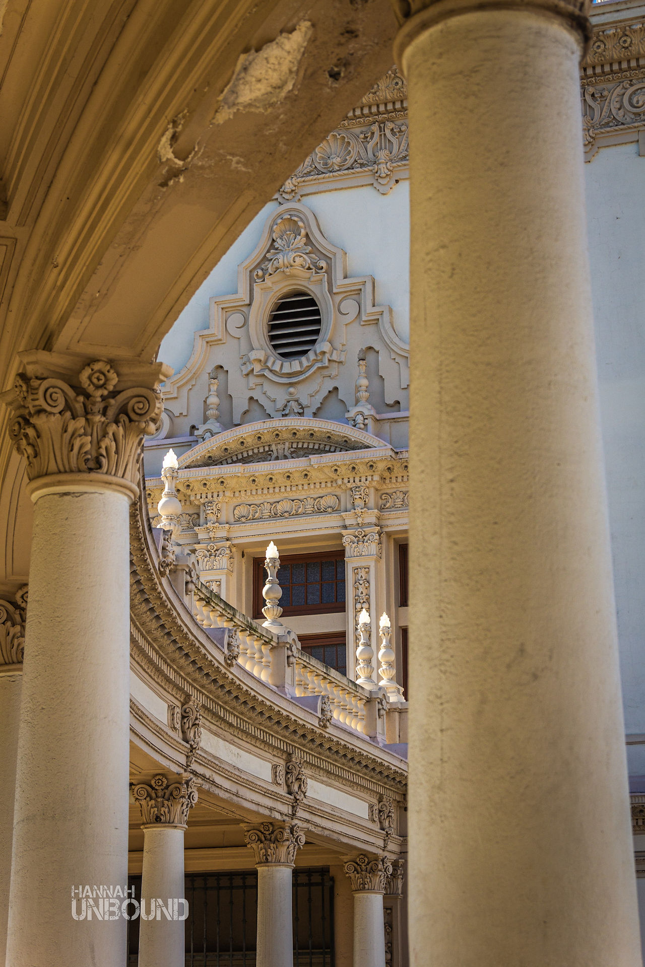 A view of  the architecture of Balboa Park through two pillars