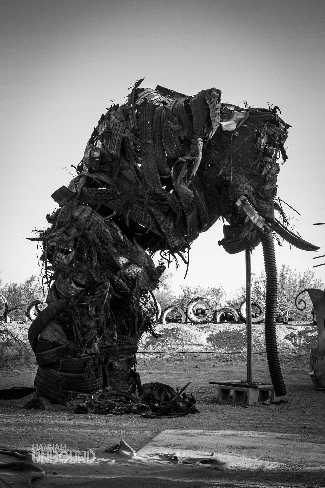 A large mammoth sculpture made out of tires in East Jesus California