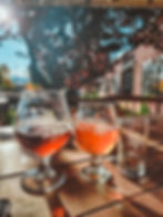 Three glasses of Snowbank Brewing Beer on the outside patio of the Snowbank Brewery