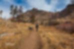 A woman not following trail etiquette while hiking
