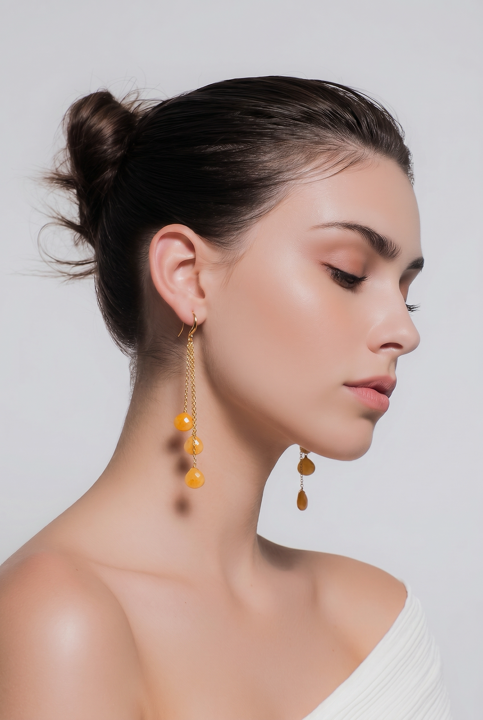 Boucles d’oreilles MOONSSOON agate jaune portées