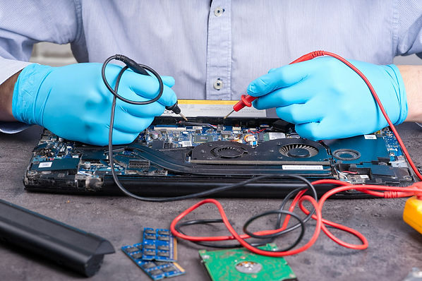 hands-fixing-motherboard-of-pc-or-laptop-notebook-close-up-in-service-laptop-repair-servic