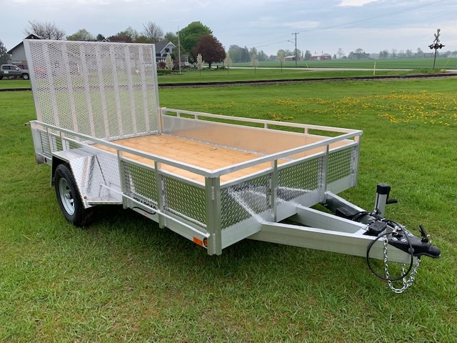 Aluminum Trailer Parked on Grass