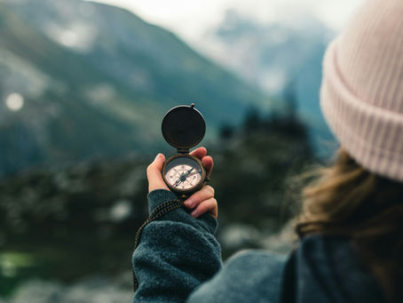 Woman holding a compass