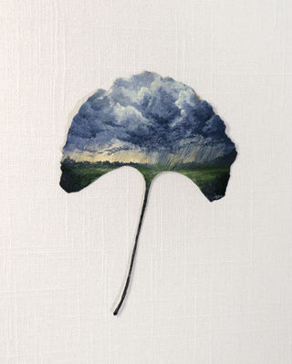storm clouds and rain painted on a ginkgo leaf