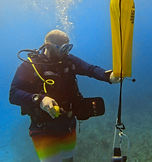 diver rigging and securing lift bag on search and recovery specialty