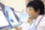 Doctor examining X-ray