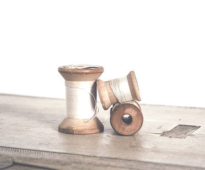 Vintage thread spools on bench_edited_ed
