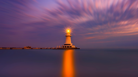 lighthouse with purple sky