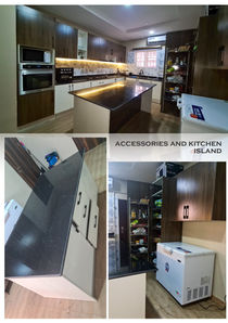 Modern kitchen with island, built-in appliances, pantry. ACCESSORIES AND KITCHEN ISLAND.