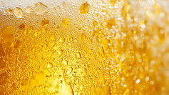 golden-beer-texture-close-up-of-frothy-condensation-covered-beer-free-photo (1).jpg