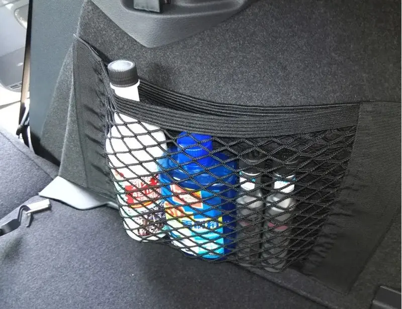 Netztasche mit Klett an Vlies-Seitenwand angeklettet, Gegenstände verstaut