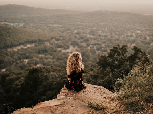girl watching sunset on cliff_edited.jpg