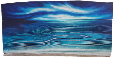Turquoise and blues, seascape on reclaimed lumber emphasizing the grain in the wood mirroring the lines in the sand at the shoreline.