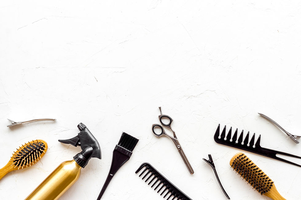 Beauty saloon accessories - combs, sciccors for hairdressing - on white background top-dow