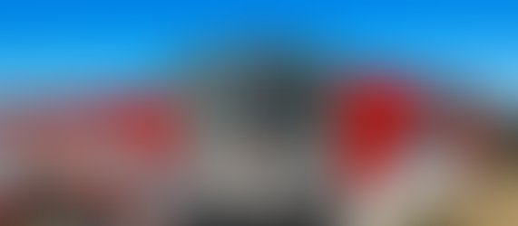 Exterior view of a modern climate-controlled storage facility with insulated walls, HVAC vents, and secure indoor units.