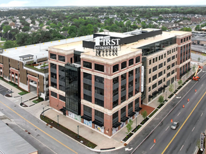 Aerial view of First Internet Bank’s headquarters in Fishers, Indiana — the site connected to Blackstone Real Estate Debt Strategies’ acquisition of up to $869 million in single-tenant-lease financing loans. The transaction underscores Blackstone’s expanding push into commercial real estate debt as banks retrench, aligning with its broader U.S. CRE portfolio strategy.