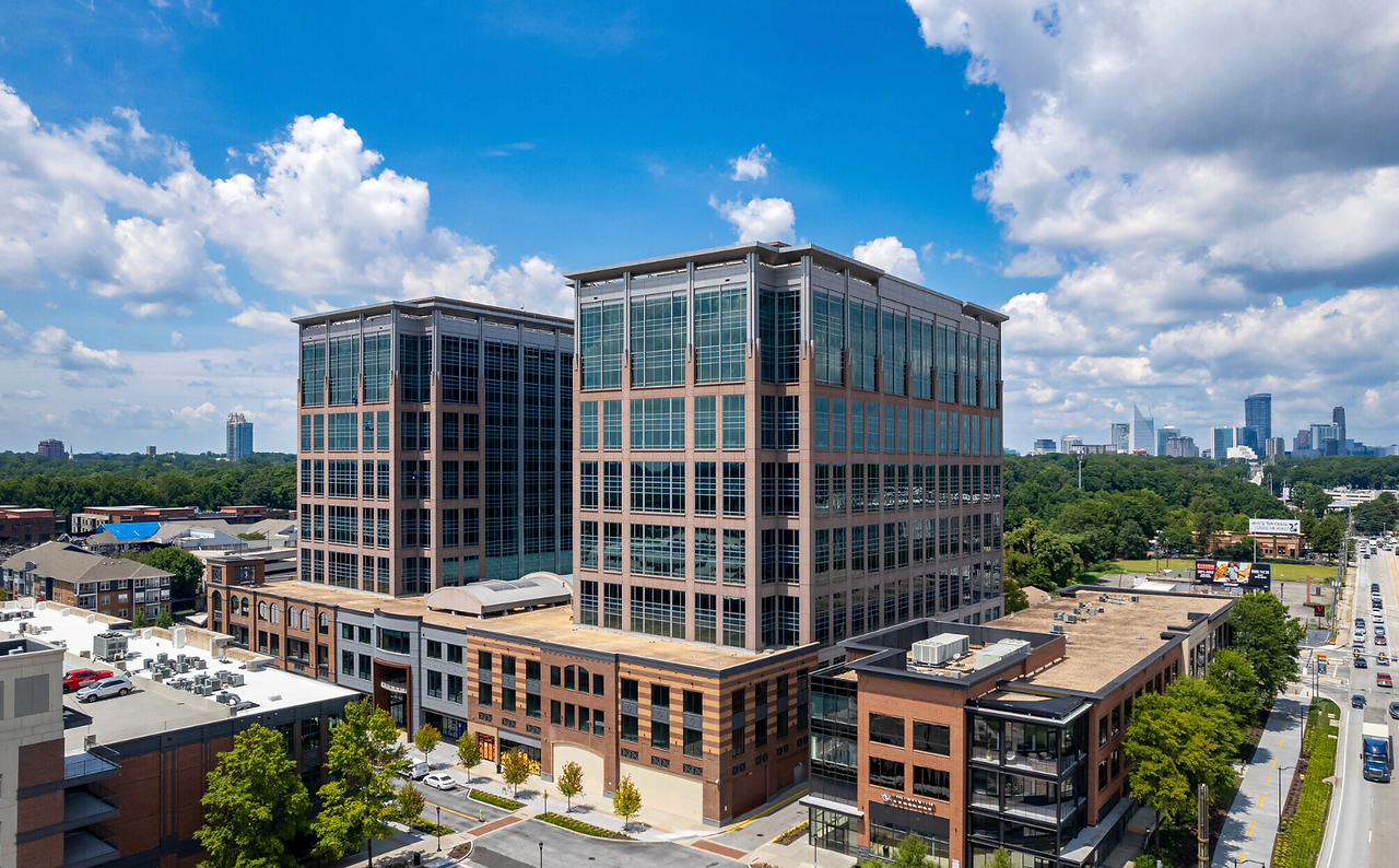 Modern U.S. office buildings with rising vacancy rates amid remote and hybrid work shift.