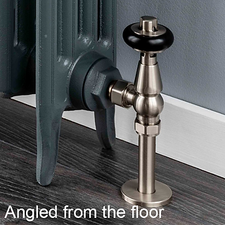 A radiator valve that is angled from the floor