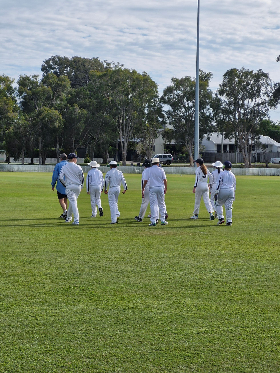 Under 13 Stimpson taking their first walk out to the center of Filmer Park