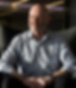 Picture of Dr Matt Jacobs PhD sitting with sun on his face