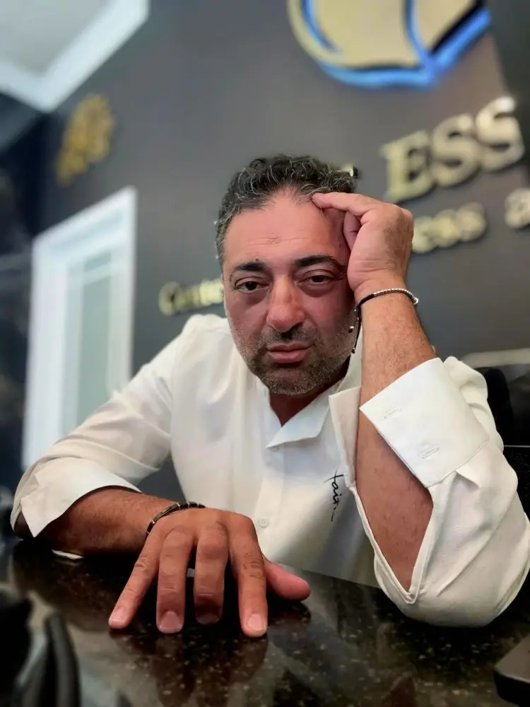 Pure Essence Center owner Costantino at the office
