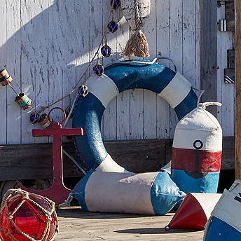 Thumbnail: BUOY SHAPED CUSHION WITH ANCHOR PRINT