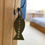 Thumbnail: Green cotton fish hanger with word chambre in white embroidered on the front