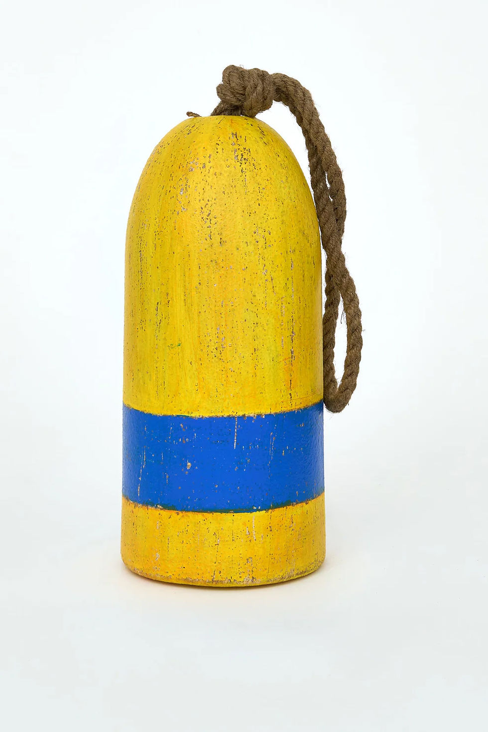 Thumbnail: Yellow wooden buoy with bright blue stripe nautical decoration