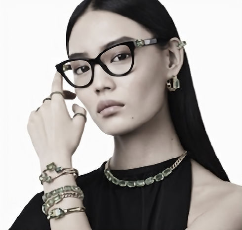 Trendy-woman-wearing-swarovski-glasses-in-black-plastic-and-swarovski-crystals